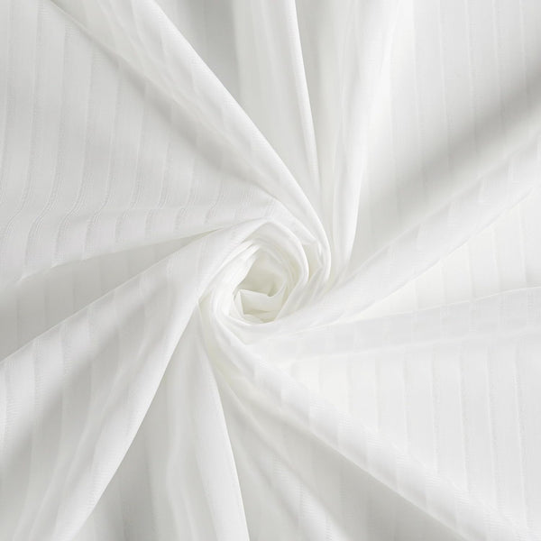 Close-up of elegant white sateen fabric with subtle vertical stripe texture, artfully twisted into a spiral.