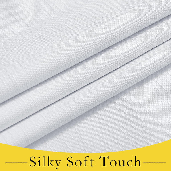 Close-up of a white textured woven fabric swatch, showing its fine, soft weave and natural folds.