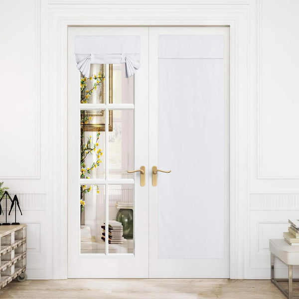 White fabric tie-up Roman shade and privacy panel on double French doors for light control.