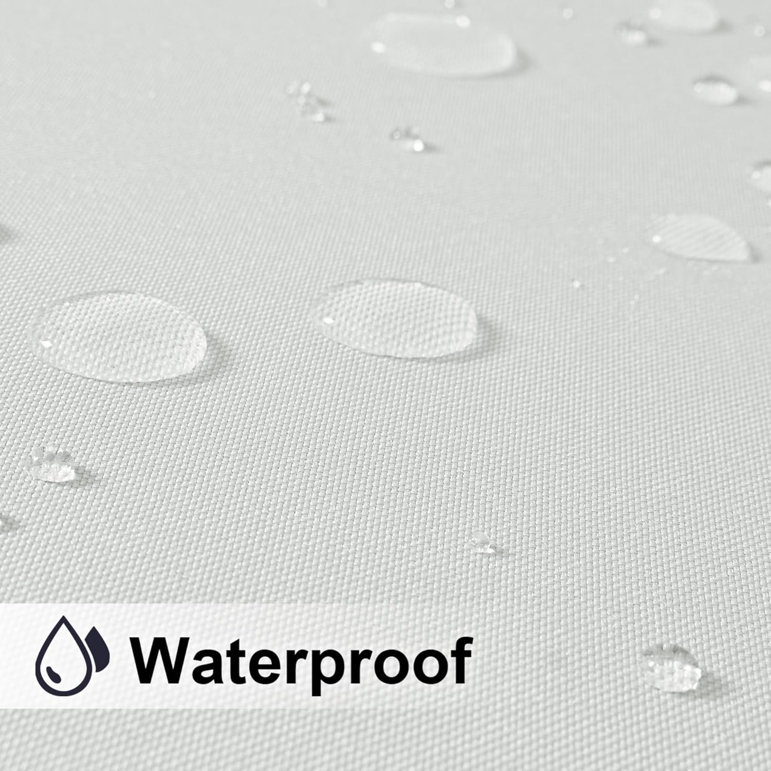 Close-up of white woven fabric with water droplets beading on surface, highlighting its waterproof property.