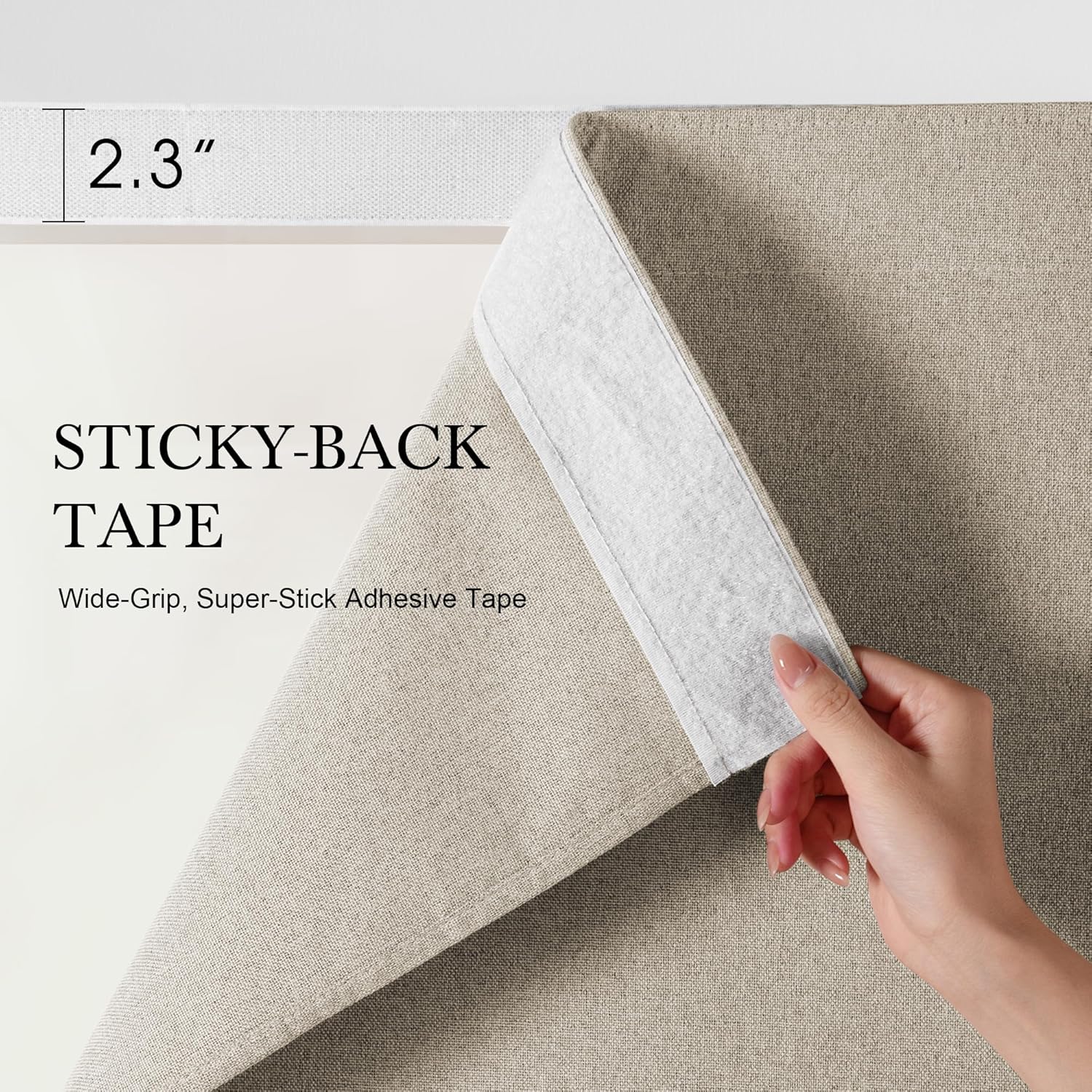 Hand peeling white 2.3-inch wide sticky-back tape from beige fabric, showing its hook-and-loop texture.