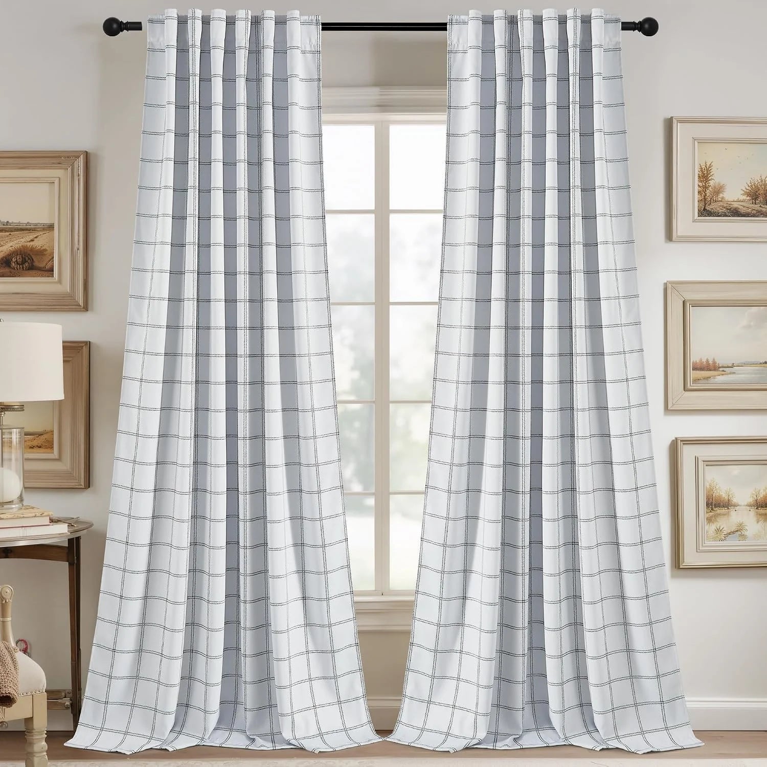 White windowpane plaid curtains on a black rod in a bright farmhouse-style room