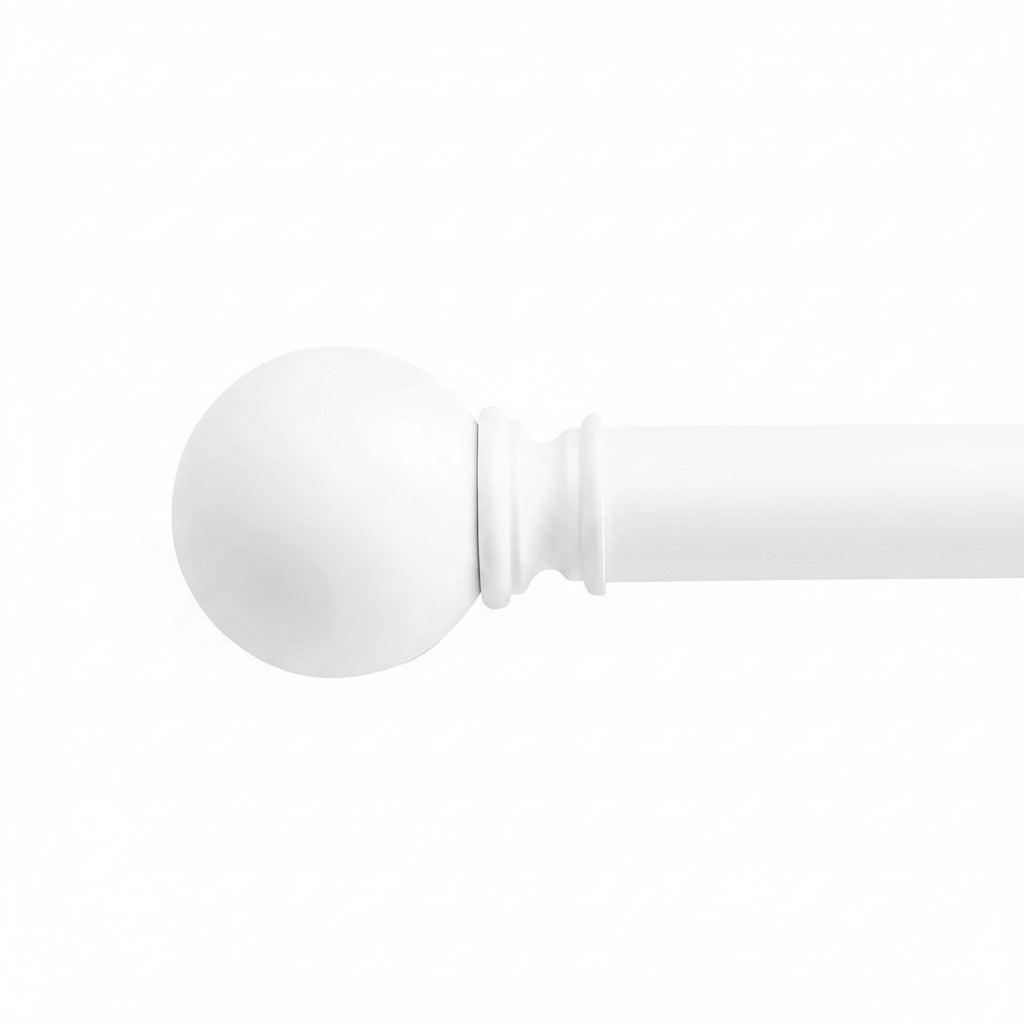 White wooden curtain rod with round ball finial shown in close-up