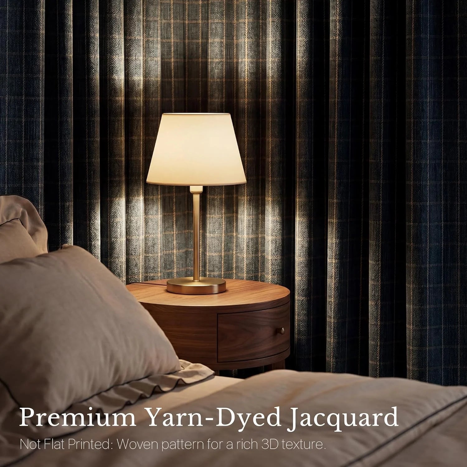 Close-up of yarn-dyed jacquard plaid curtains next to a bed and warm table lamp.